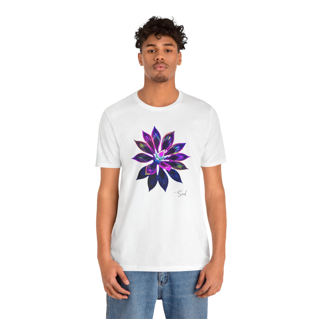 A man in a t-shirt featuring a bold, psychedelic floral design.