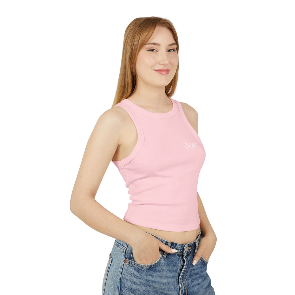 A chic pink cropped tank top featuring the elegant 'Soul Art' logo in a vibrant orange font on the chest of a mockup of a girl. This minimalist design exudes sophistication while celebrating creativity and individuality.